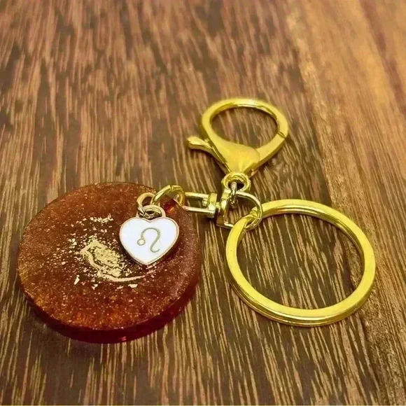 Gold Tone Keychain with Hand Crafted Zodiac Leo Medallion and Heart Charm - Picture 1 of 2